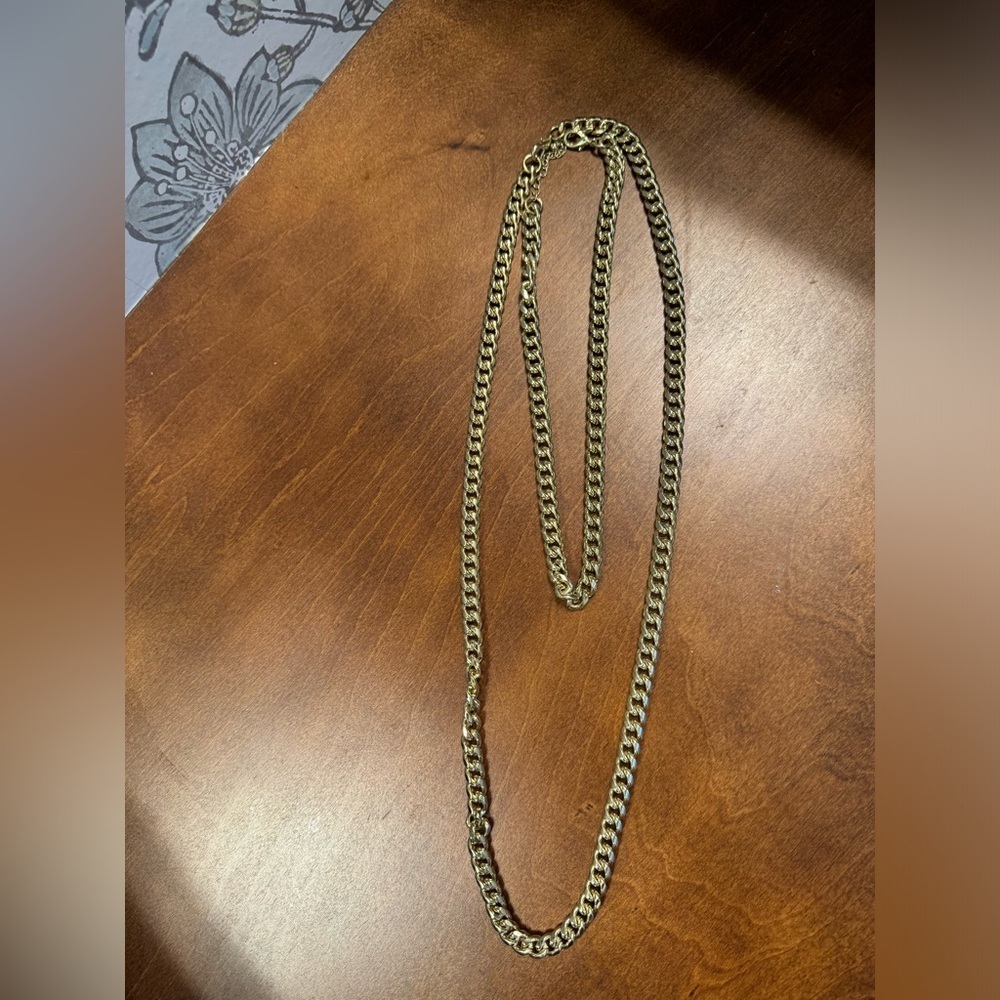 Two gold colored matching chain necklaces (different lengths to stack)